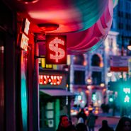 people walking on street during night time