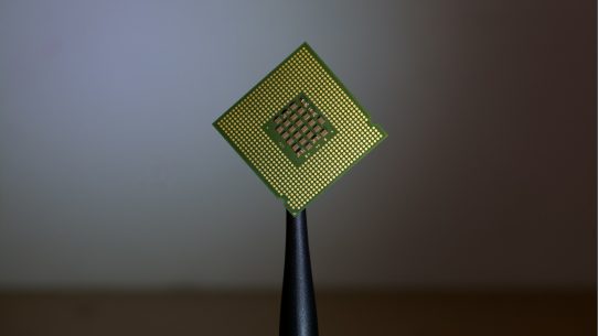 person holding computer cell processor