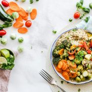 Colorful quinoa salad with fresh vegetables creates a healthy, balanced meal.