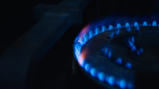 a close up of a blue flame on a stove