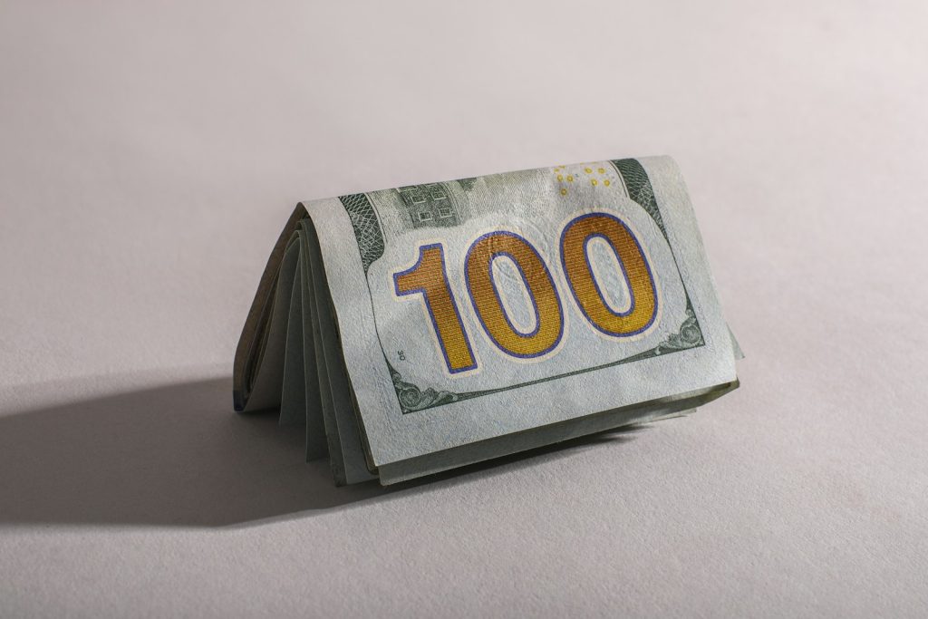 A stack of one hundred dollar bills