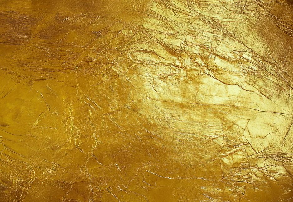 Luxurious gold leaf texture ideal for elegant and creative backdrops.