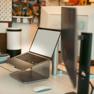 A laptop computer sitting on top of a desk