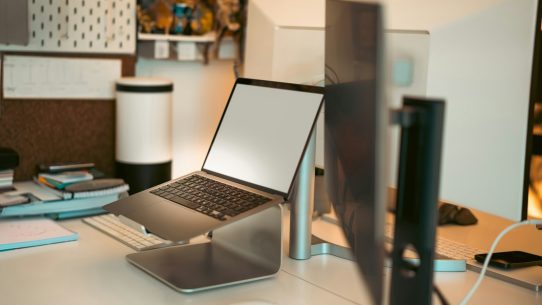 A laptop computer sitting on top of a desk