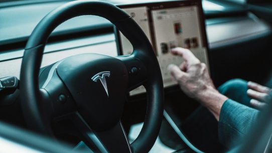 black Tesla steering wheel